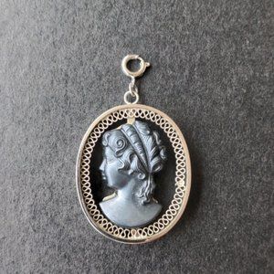 Vintage black Cameo pendant in silver tone filigree setting